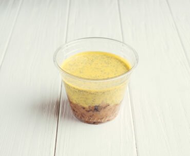 Curd mousse with poppy seeds and prunes